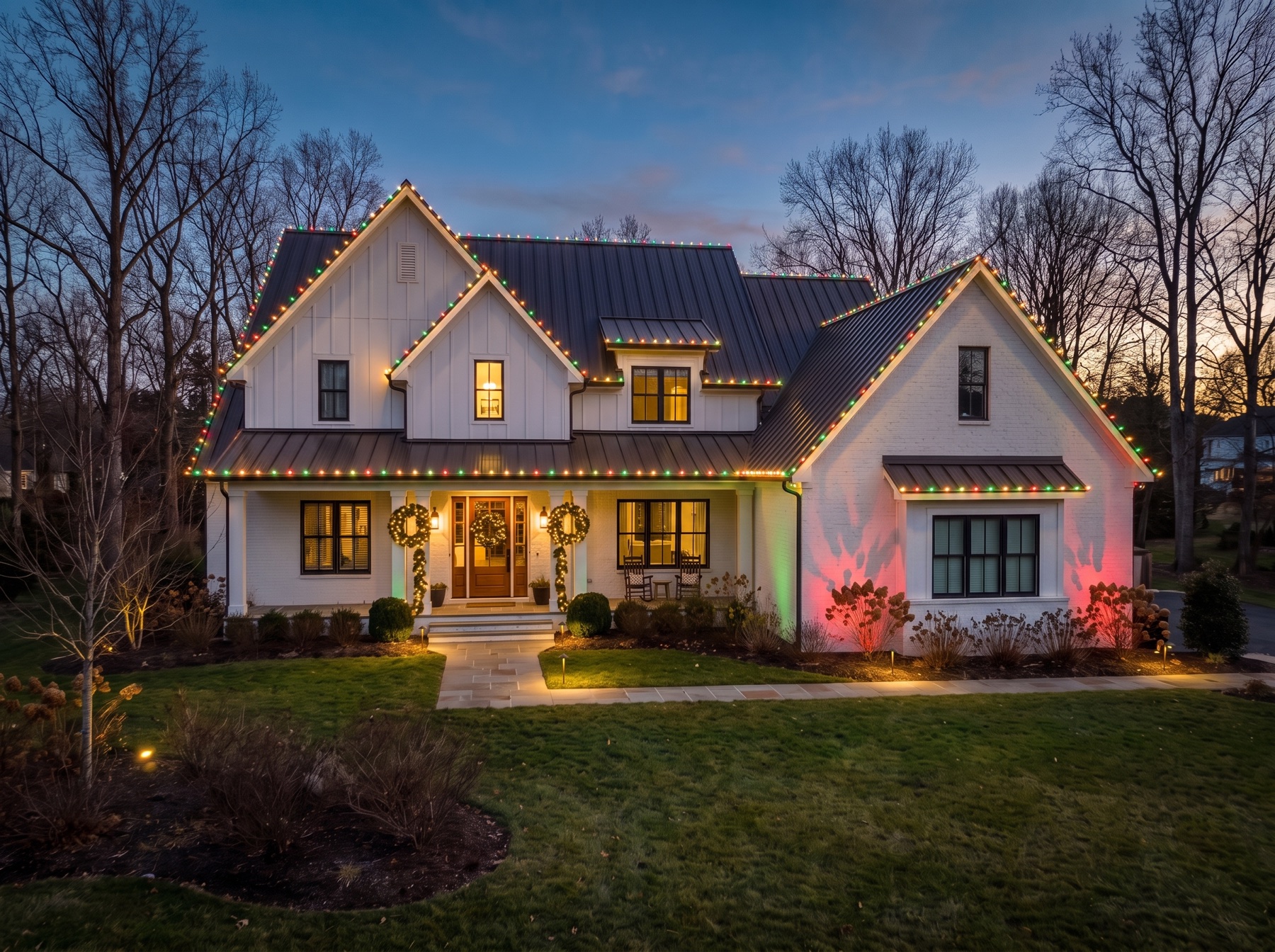 Design visualization of red, green, and warm white Christmas roofline lighting on a luxury Atlanta home