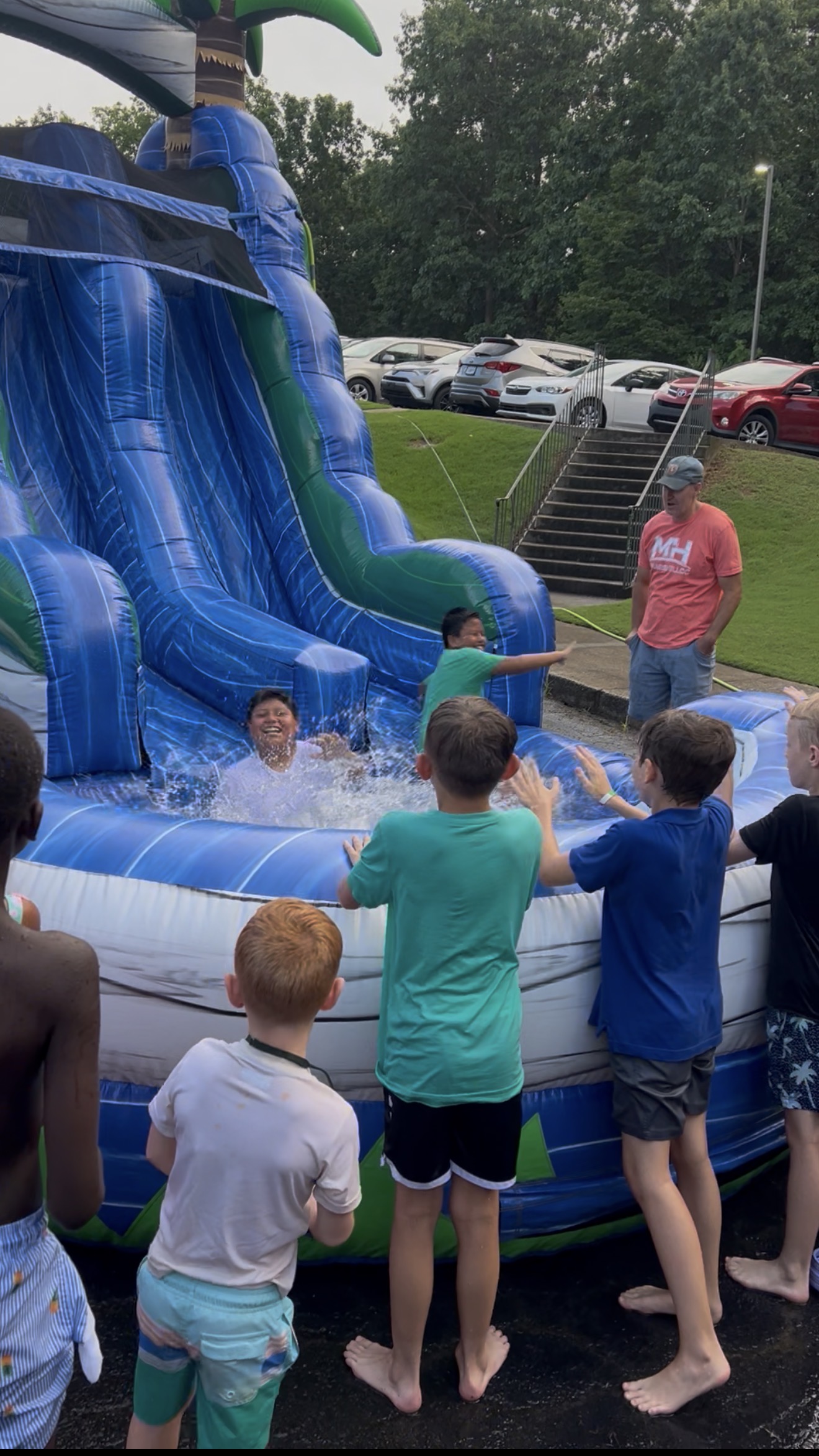 Kids on water slide rental Dallas GA
