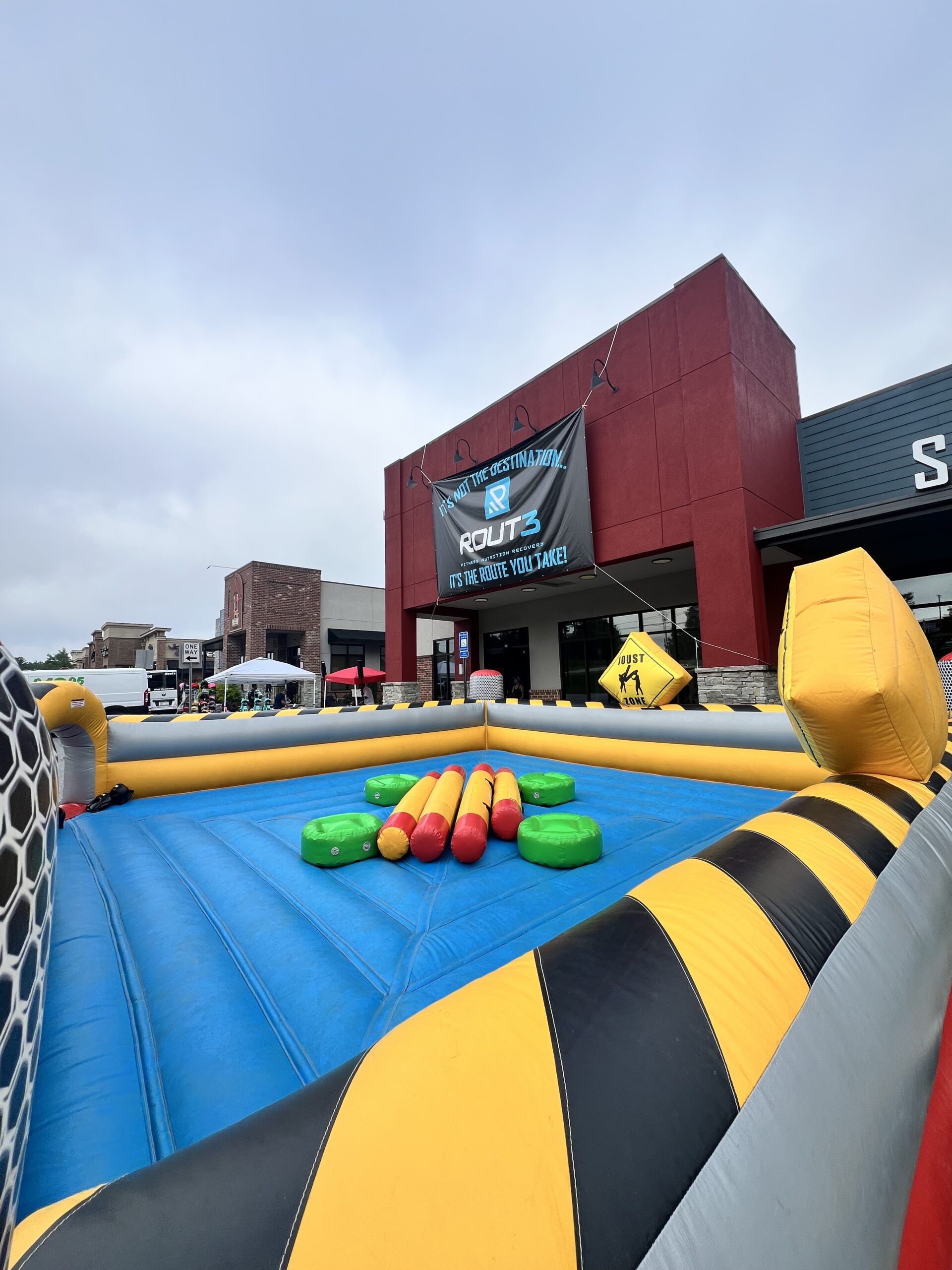 High Voltage 4-man joust inflatable game rental Canton GA field day