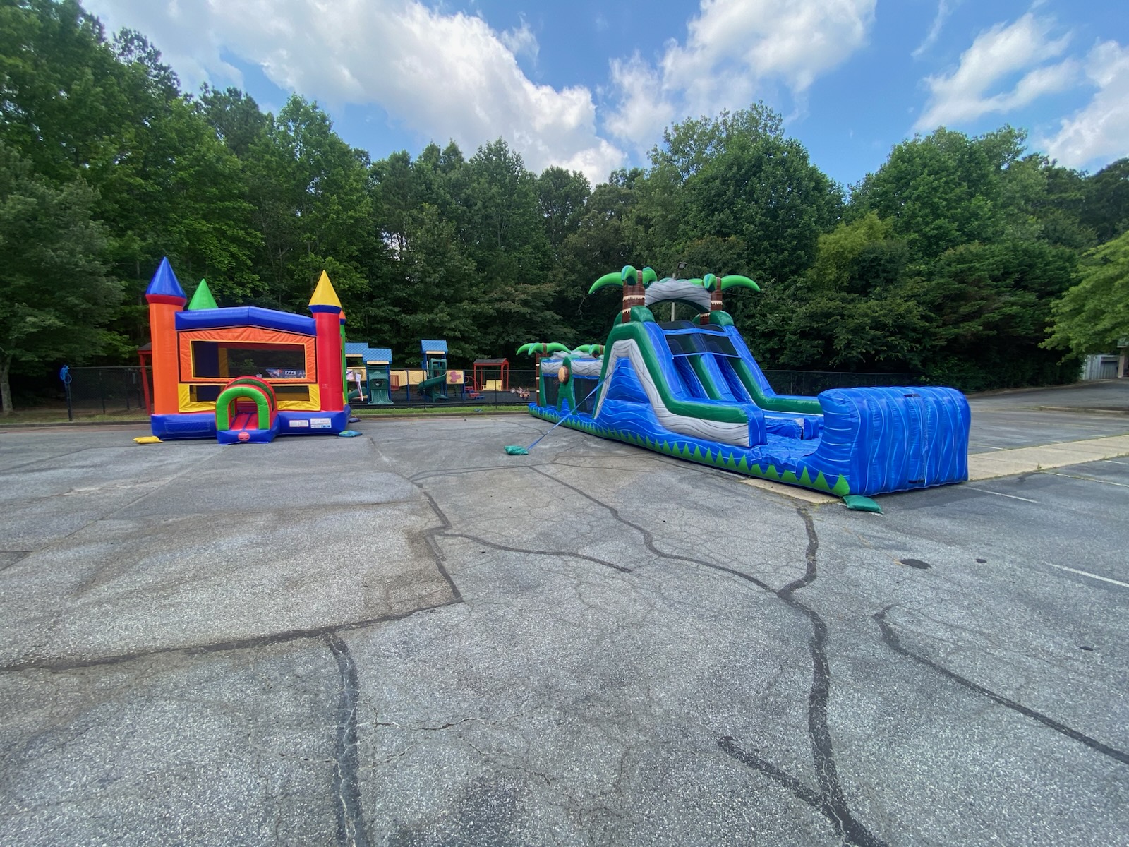 Colorful castle bounce house rental set up by Bounce House Woodstock in Woodstock GA