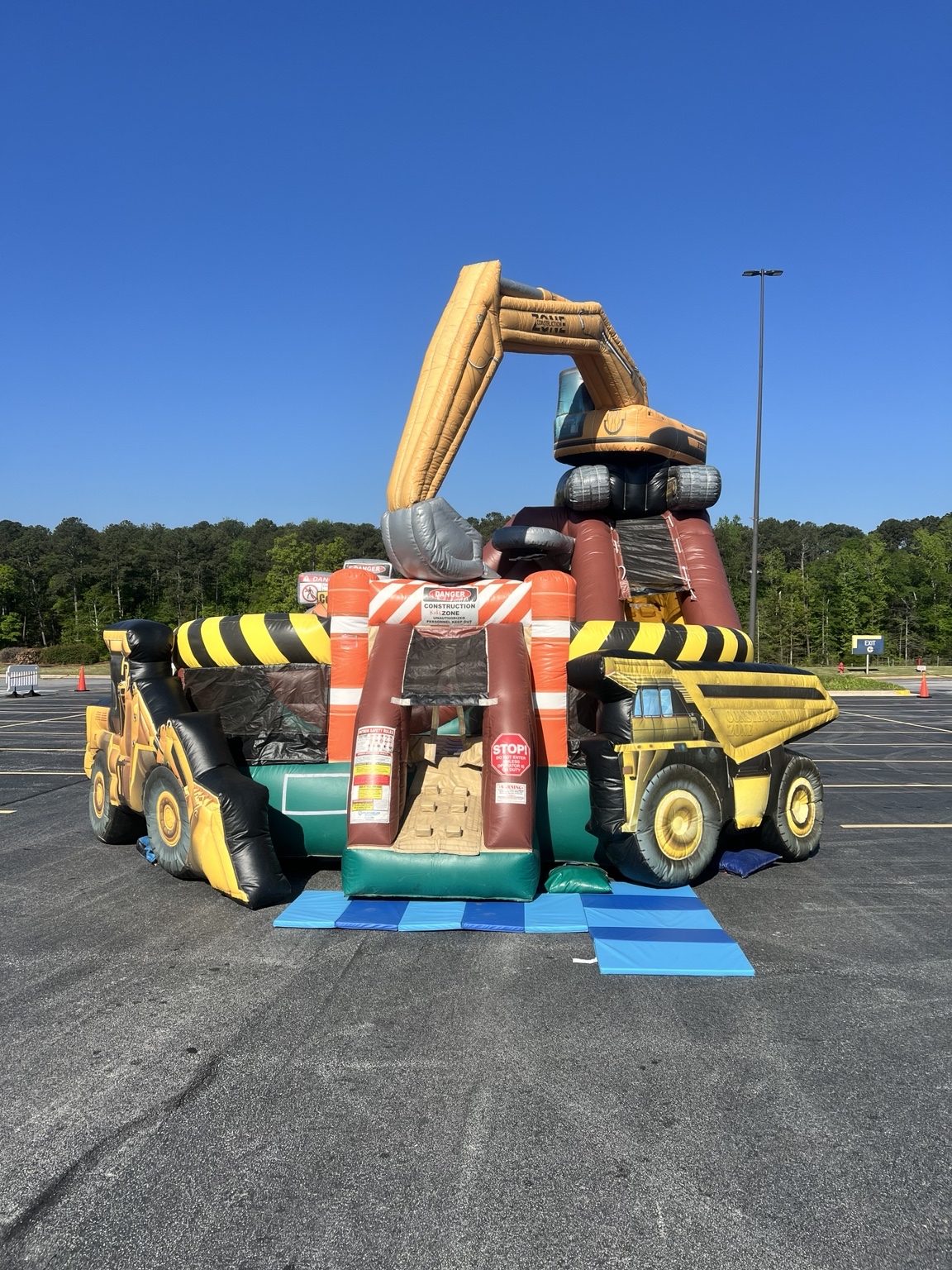 Bounce House Woodstock owner preparing to staff a Tanger Outlets family event
