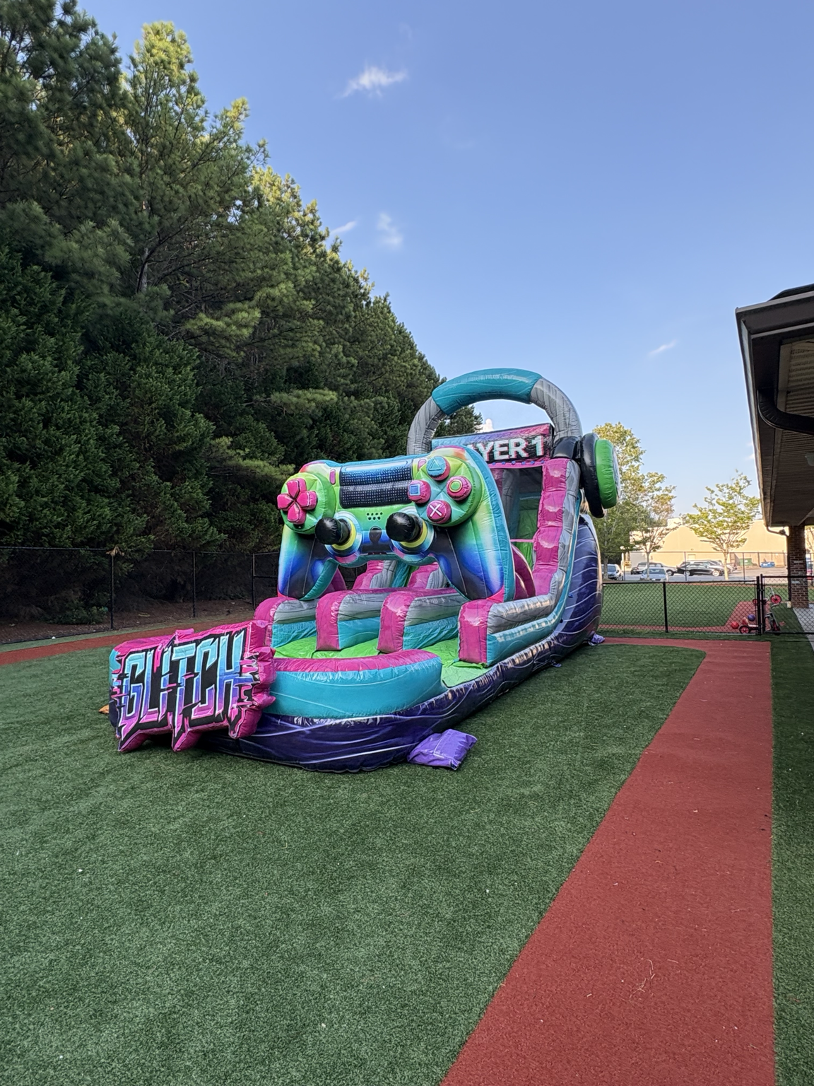 Rotating weekly inflatable setup at Discovery Point daycare in Canton