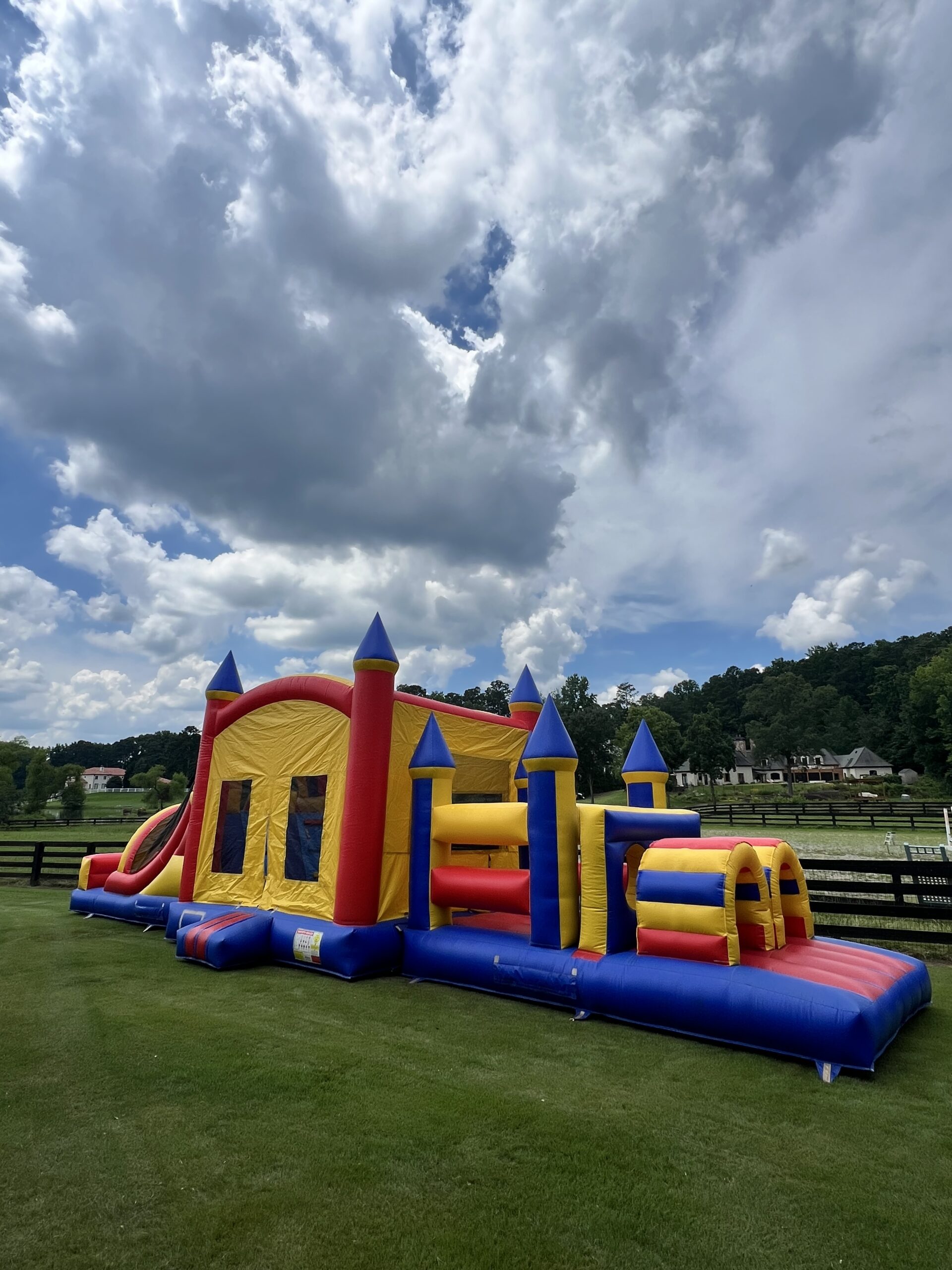 Classic inflatable obstacle course setup on grass