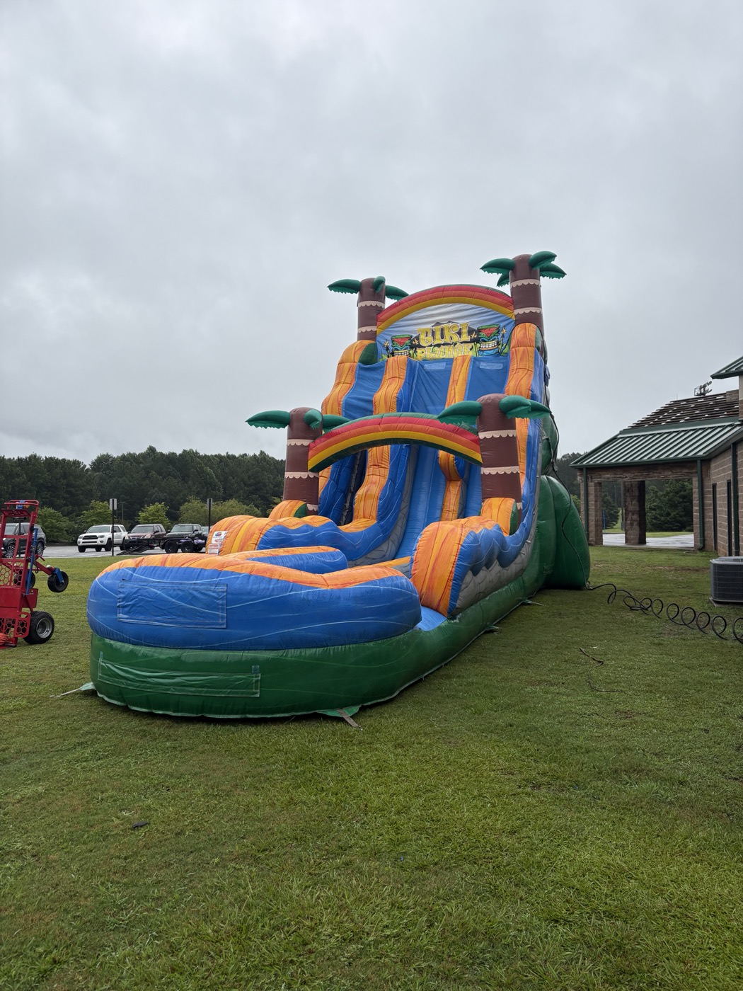 Large tropical water slide prepared beside an event venue